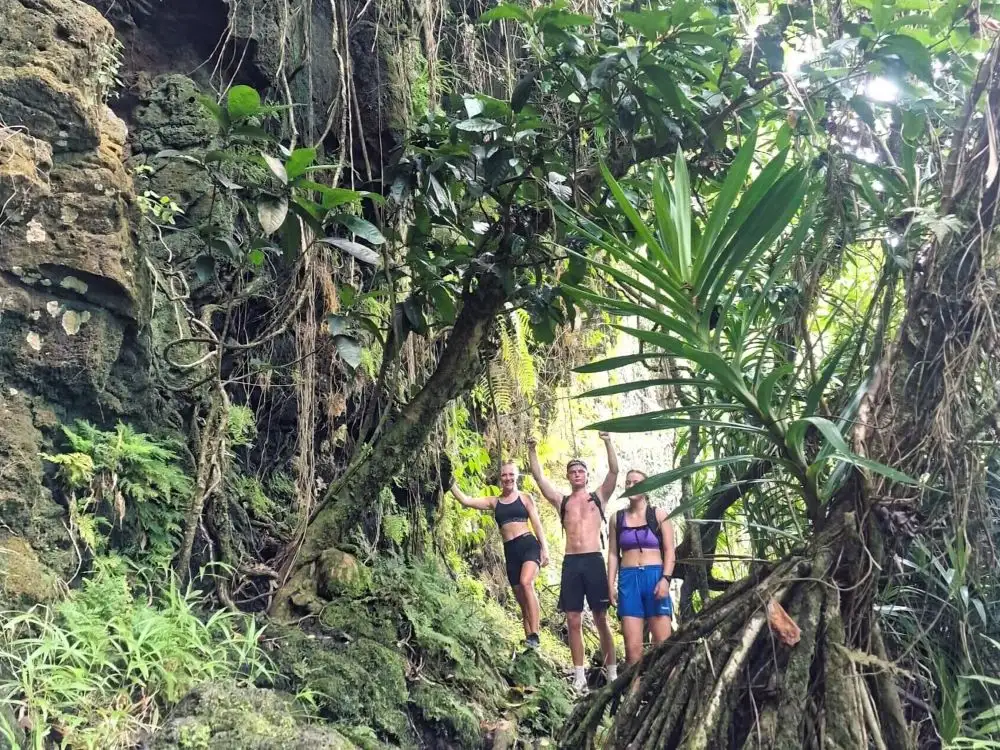 Three hikers on the Mount Piri Hiking Trail in French Polynesia