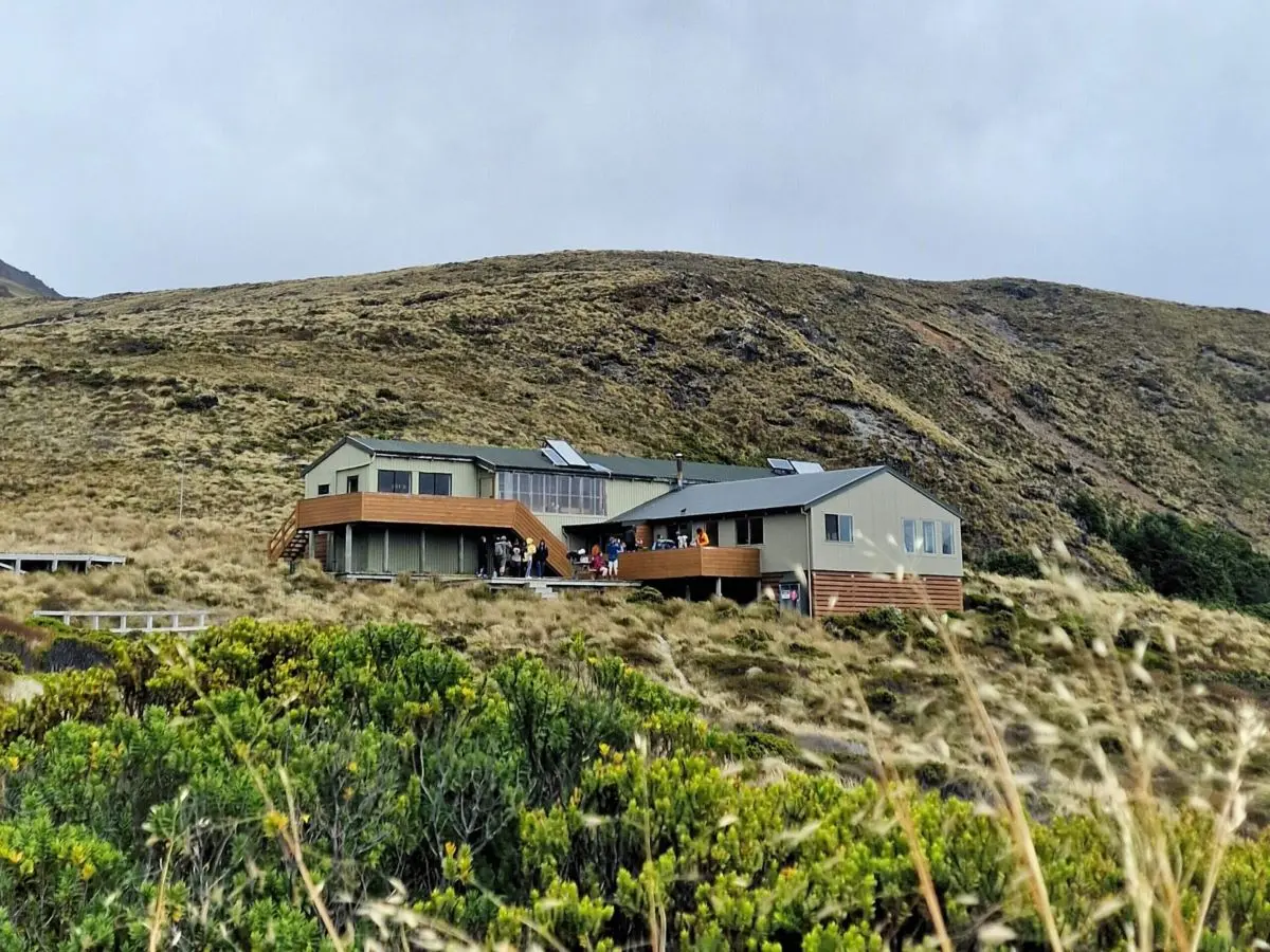 Luxmore Hut at 1085m on the Kepler Track, a popular turnaround point for Fiordland day hikers.