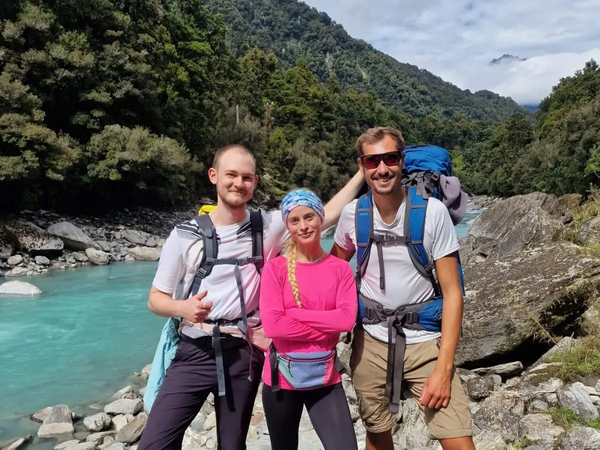 Three hikers on the Copland Track to Welcome Flat Hut trail in New Zealand (2026)