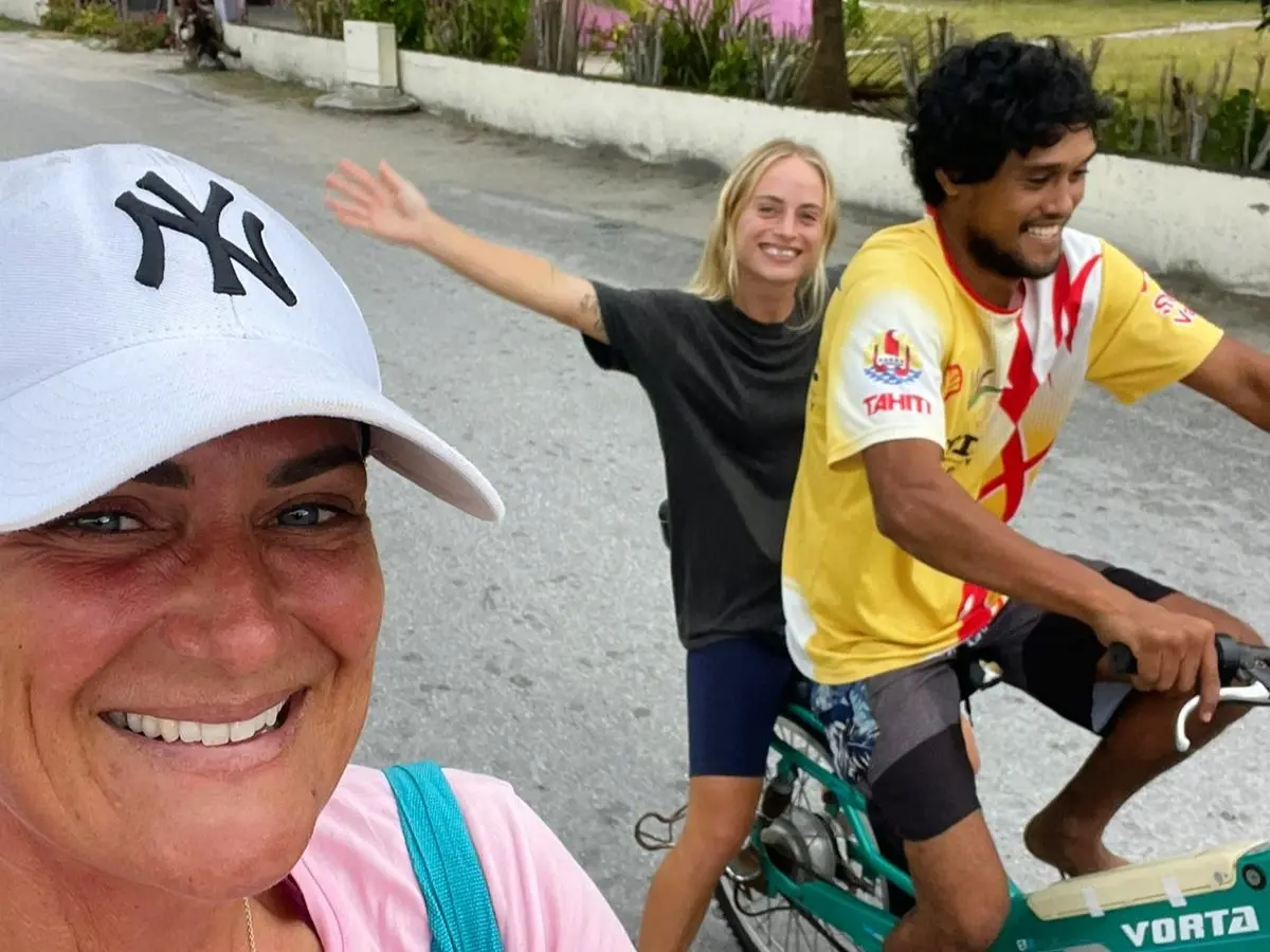 Rainui and I cycling through the atoll of Makemo in French Polynesia