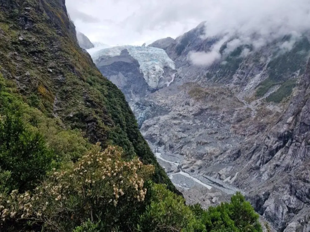 View of the Franz Josef Glacier from Roberts Point Track - one of the best hiking trails on the West Coast of New Zealand