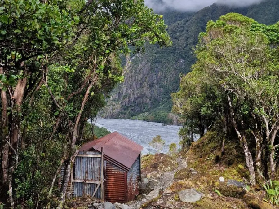 Hende's Hut on the Roberts Point Track leading to the Franz Josef Glacier in New Zealand