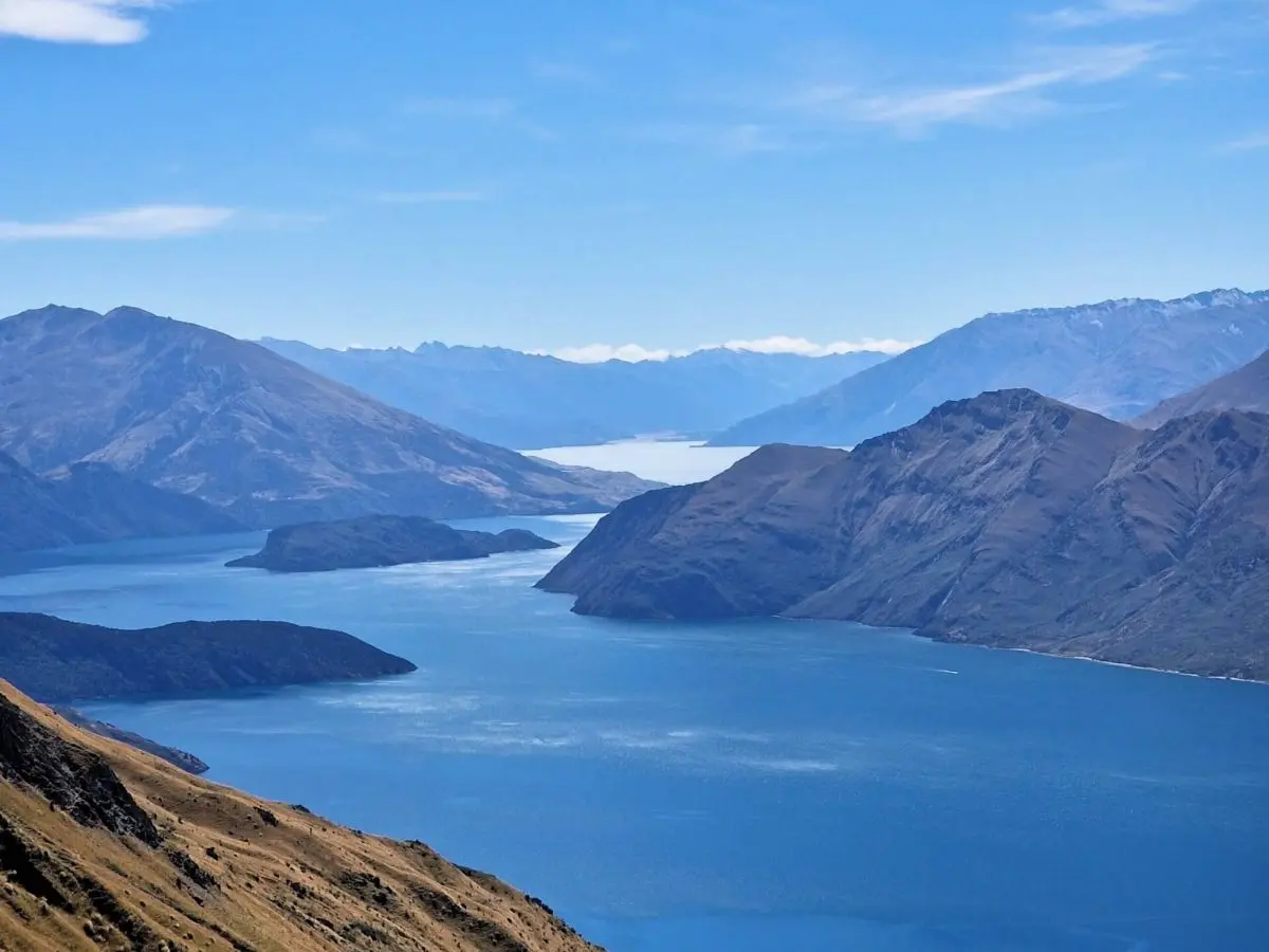 The stunning blue lake from the Roys Peak Track near Wanaka, New Zealand