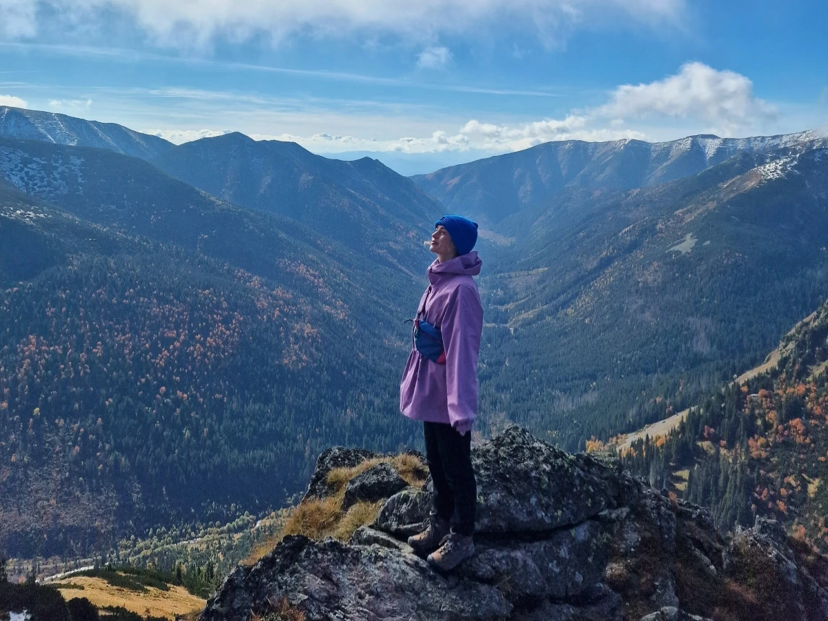 Sara Fondo standing on a mountain in Tatra Mountains in Poland